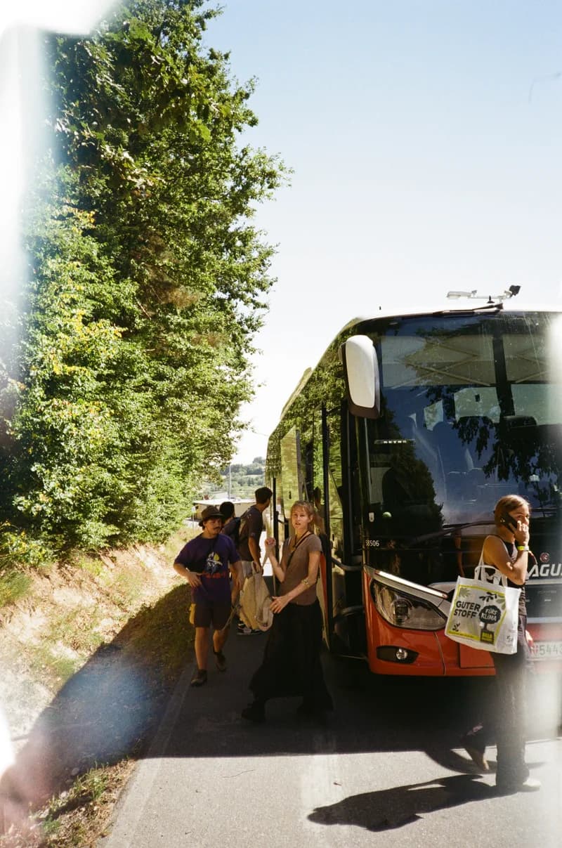 Festival-goers boarding the official shuttle bus
